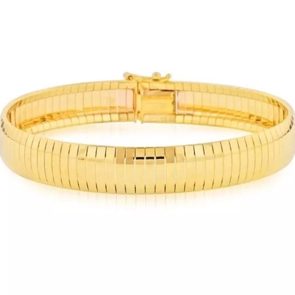 Jewelry - $120 Gold Over Bronze Soft Bangle Bracelet